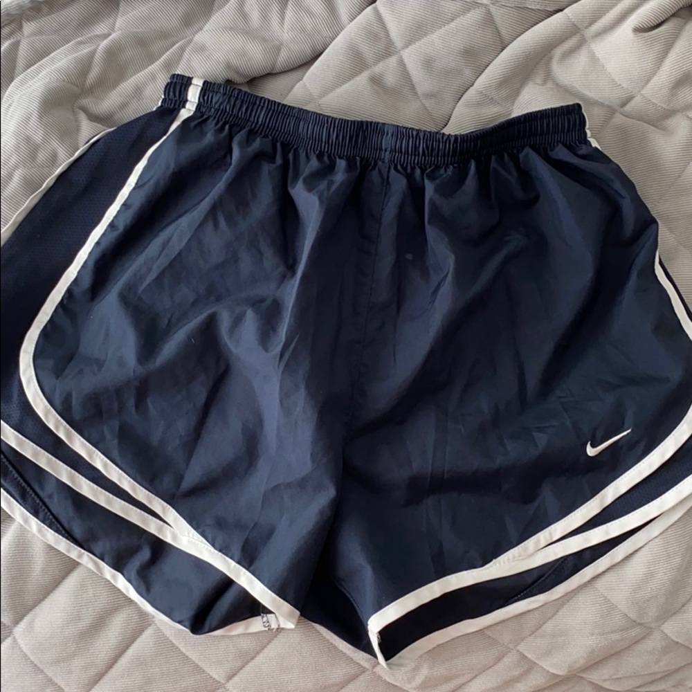 Blue Nike athletic shorts